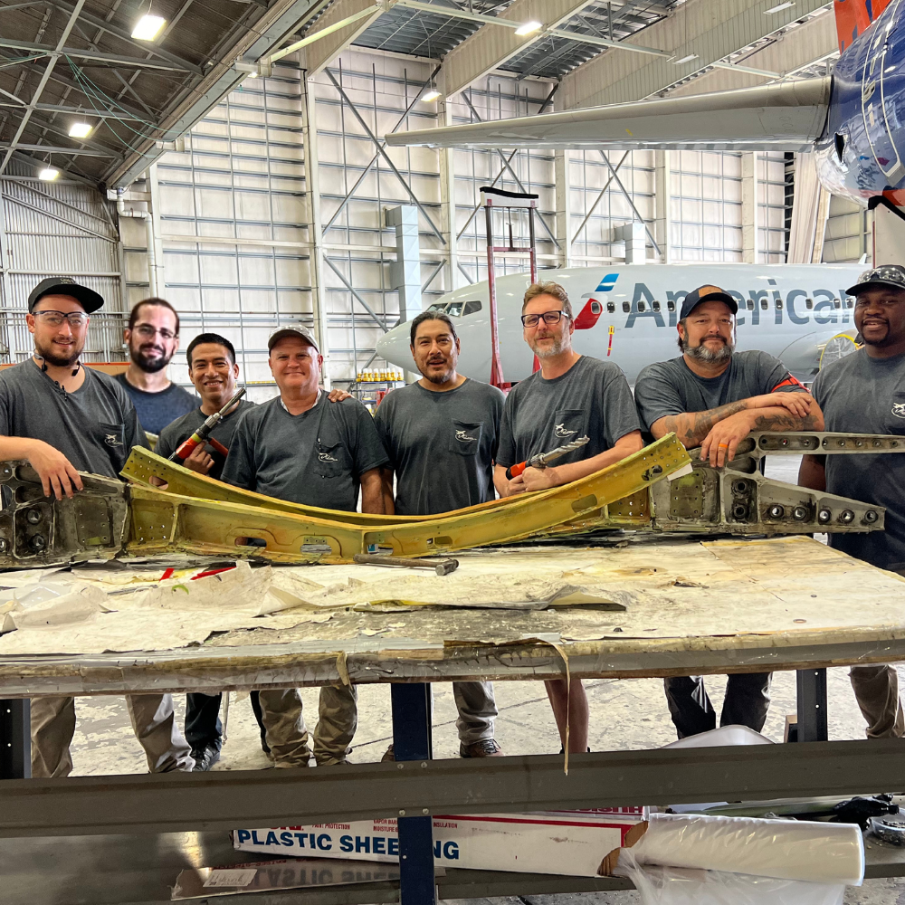 Aircraft Maintenance Mobile Response Team performing heavy repair inside an MRO hangar