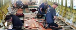 Aircraft maintenance professionals working in an aviation hangar environment for VP Aviation staffing support.